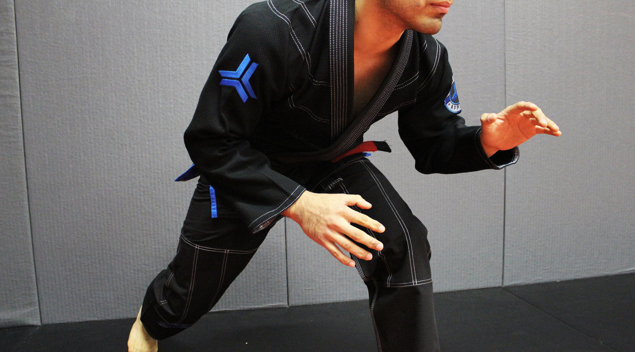 Open Guard Apparel Black Blizzard Gi now available in www.openguardapparel.com Teal accents across the gi ready for the mats.