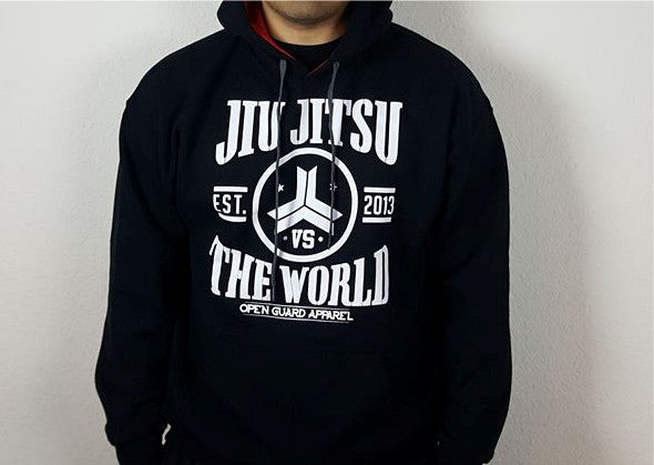 Open Guard Apparel Warm hoodies from the fall collection. Jiu Jitsu VS the world edition.
Black hoodie with red inside the hood.