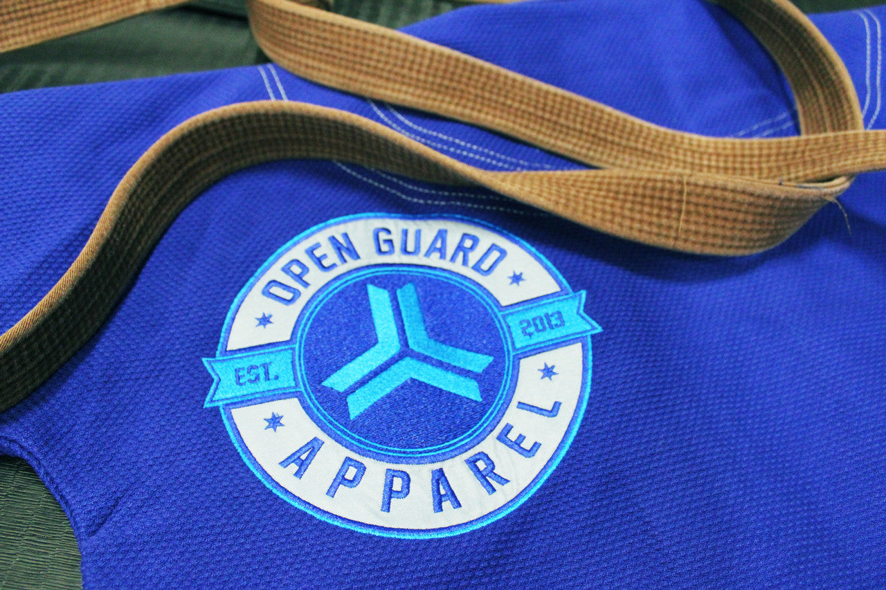 Royal Blue Open Guard Apparel Blizzard Gi. Great for training or competition. Teal accents across the gi. Ultra Light Gi
