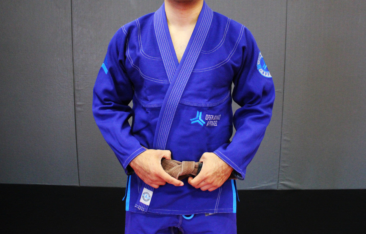 Royal Blue Open Guard Apparel Blizzard Gi. Great for training or competition. Teal accents across the gi. Ultra Light Gi