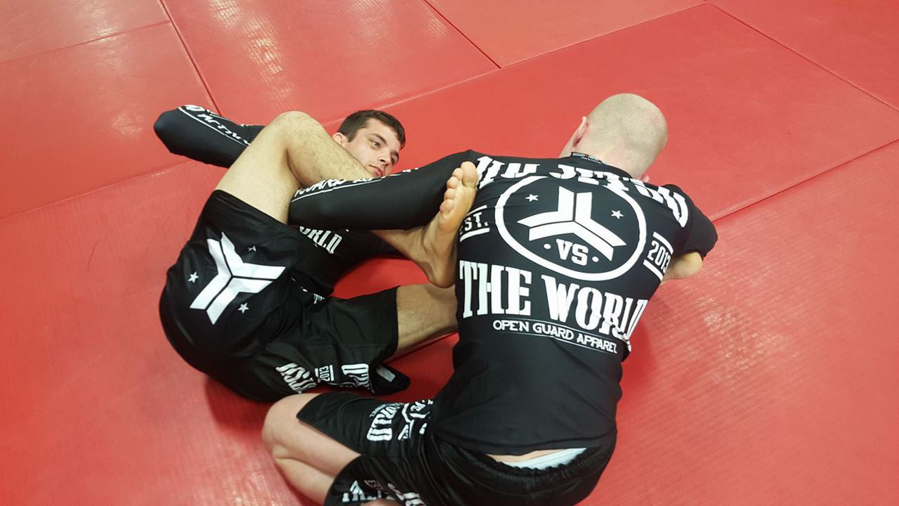 OGA Jiu Jitsu Vs The World Fight Shorts. Great for BJJ and MMA. Black and White Grappling Shorts from Open Guard Apparel.