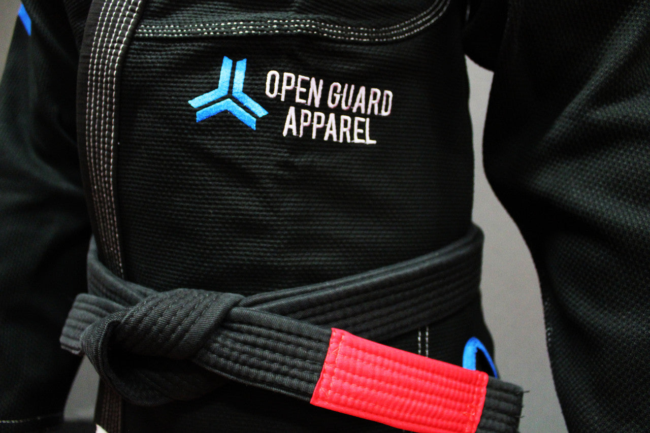 Open Guard Apparel Black Blizzard Gi now available in www.openguardapparel.com Teal accents across the gi ready for the mats.