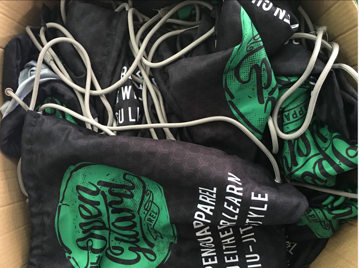 Free Open Guard Apparel Gi Bag with your purchase of the OGA Circle Flow Gi in Tactical Sand/ Emerald. Grey Cords with a beautiful fully sublimated Gi bag.