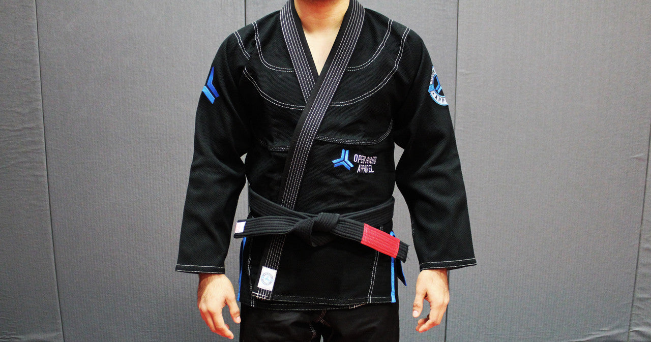 Open Guard Apparel Black Blizzard Gi now available in www.openguardapparel.com  Teal accents across the gi ready for the mats. 