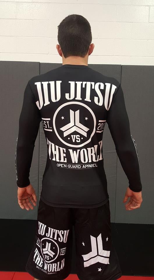 back of the shorts OGA Jiu Jitsu Vs The World Fight Shorts.  Great for BJJ and MMA.  Black and White Grappling Shorts from Open Guard Apparel. 
