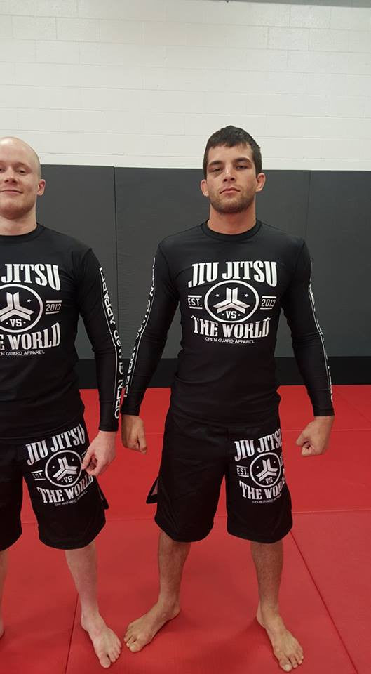 Jiu Jitsu Vs the world rashgaurd in black.