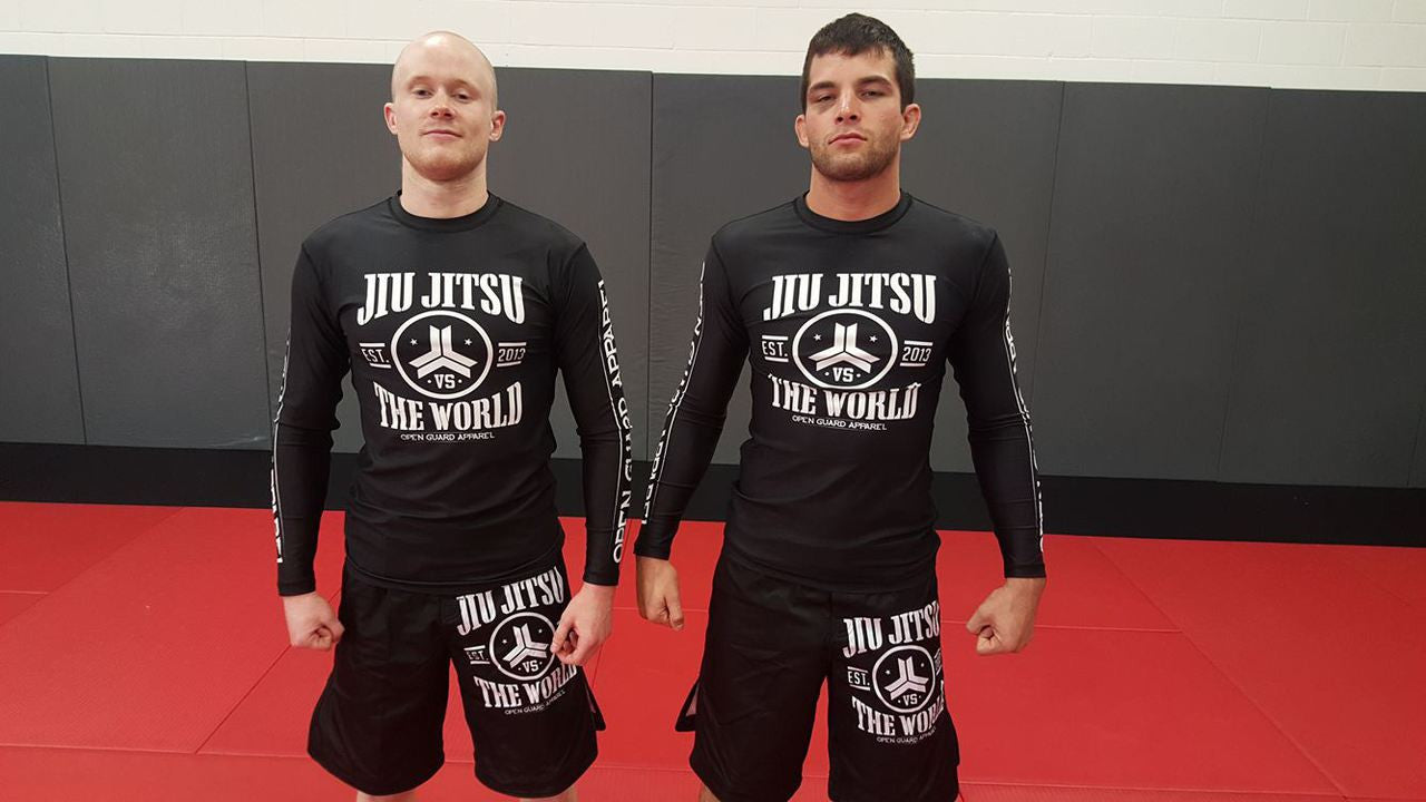 OGA Jiu Jitsu Vs The World Fight Shorts.  Great for BJJ and MMA.  Black and White Grappling Shorts from Open Guard Apparel. 
