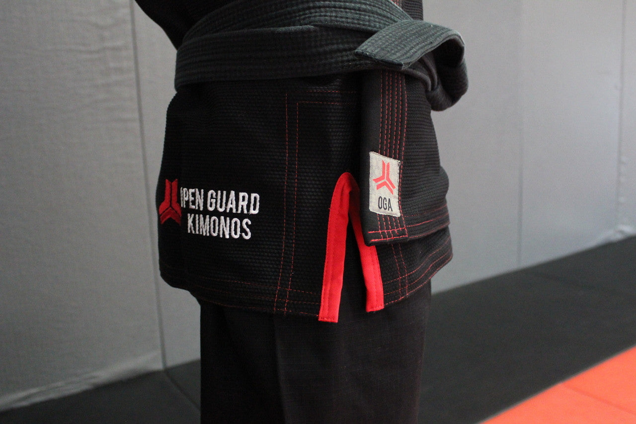 Open Guard Apparel Champion Gi in Black with red accents Available at www.openguardapparel.com

Enjoy premium bjj gear for the family. 