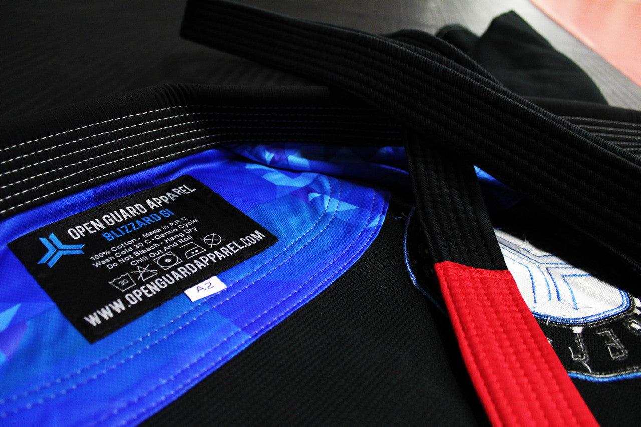 Open Guard Apparel Black Blizzard Gi now available in www.openguardapparel.com  Teal accents across the gi ready for the mats. 