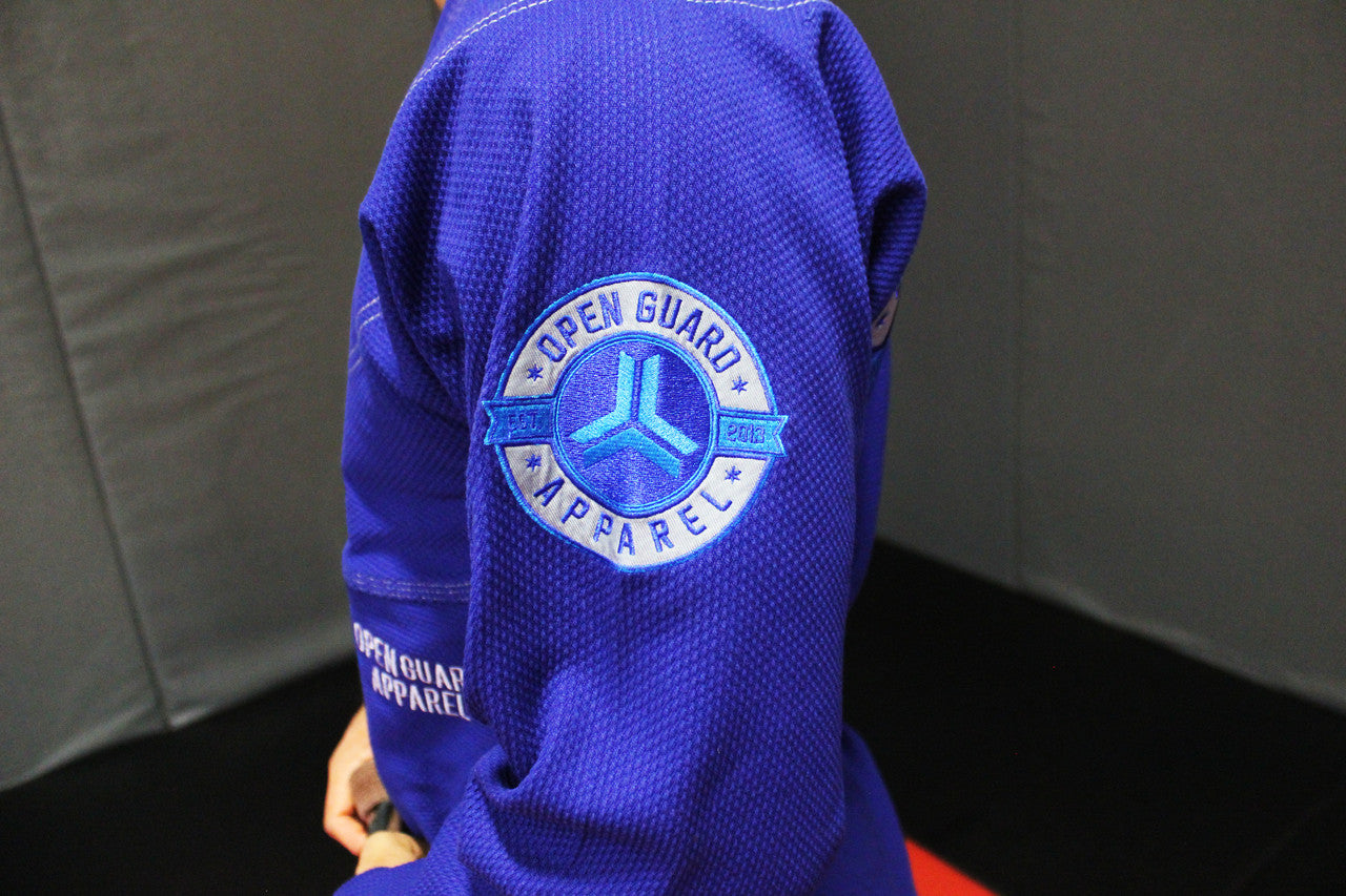 Royal Blue Open Guard Apparel Blizzard Gi.  Great for training or competition.  Teal accents across the gi.  Ultra Light Gi