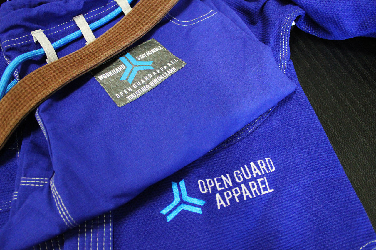 Royal Blue Open Guard Apparel Blizzard Gi.  Great for training or competition.  Teal accents across the gi.  Ultra Light Gi