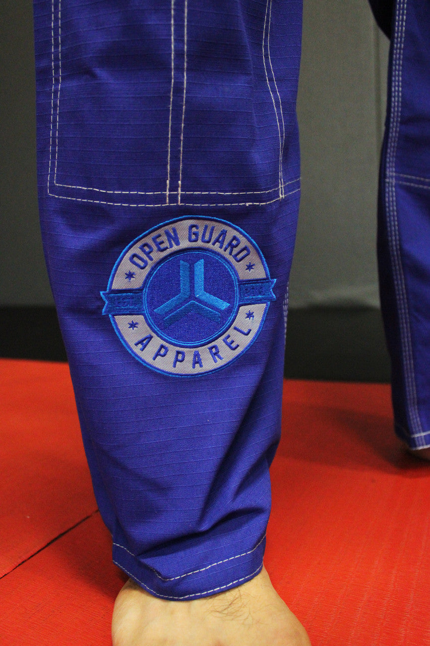 Royal Blue Open Guard Apparel Blizzard Gi.  Great for training or competition.  Teal accents across the gi.  Ultra Light Gi