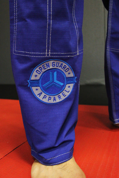 Royal Blue Open Guard Apparel Blizzard Gi.  Great for training or competition.  Teal accents across the gi.  Ultra Light Gi