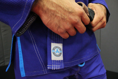 Royal Blue Open Guard Apparel Blizzard Gi.  Great for training or competition.  Teal accents across the gi.  Ultra Light Gi