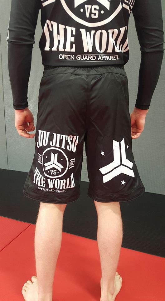 OGA Jiu Jitsu Vs The World Fight Shorts.  Great for BJJ and MMA.  Black and White Grappling Shorts from Open Guard Apparel. 
