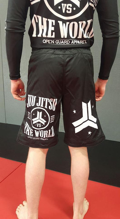 OGA Jiu Jitsu Vs The World Fight Shorts.  Great for BJJ and MMA.  Black and White Grappling Shorts from Open Guard Apparel. 
