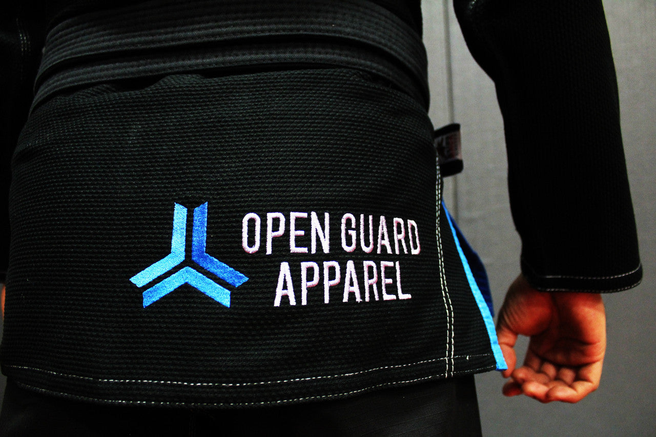 Back of the Open Guard Apparel Black Blizzard Gi now available in www.openguardapparel.com  Teal accents across the gi ready for the mats. 