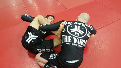 OGA Jiu Jitsu Vs The World Fight Shorts.  Great for BJJ and MMA.  Black and White Grappling Shorts from Open Guard Apparel. 
